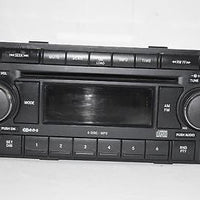 2004-2010 CHRYSLER JEEP DODGE RADIO STEREO 6 DISC CHANGER MP3 CD PLAYER - BIGGSMOTORING.COM