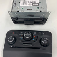 2011-2014 Dodge Charger CD player radio module non navigation with face plate controls..